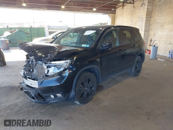 2021 Honda Passport Sport with VIN 5FNYF8H27MB021098, listed as a IAAI auction lot 41333241 with 101,239 mi miles and . Bid and sale history available at DreamBid. Image 2.