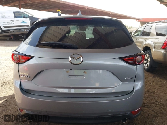 2017 Mazda CX-5 Grand Touring with VIN JM3KFADL3H0121772, listed as a IAAI auction lot 41935183 with 48,869 mi miles and . Bid and sale history available at carsss.com. Image 16.