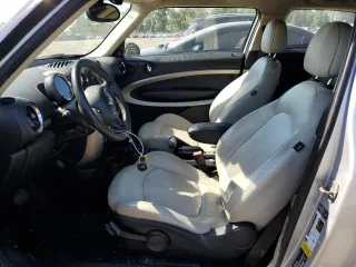 2015 MINI Paceman z VIN WMWSS1C56FWN94886, wystawiony jako Copart lot #70387184 z przebiegiem 98 574 mil mil oraz Szkoda całkowita • Salvage title. Historia ofert i sprzedaży dostępna na DreamBid. Obrazek 7.