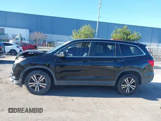 2018 Honda Pilot EX-L with VIN 5FNYF5H58JB013113, listed as a IAAI auction lot 41313206 with 125,825 mi miles. Bid and sale history available at carsss.com. Image 14.