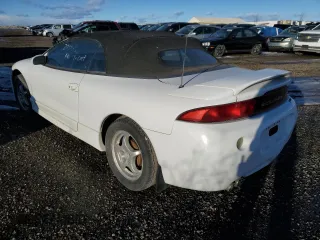 1999 Mitsubishi Eclipse GS with VIN 4A3AX35G2XE062629, listed as a Copart auction lot 87689125 with 223,210 mi miles and Salvage Title. Bid and sale history available at carsss.com. Image 3.