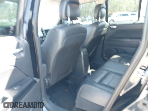 2014 Jeep Patriot High Altitude with VIN 1C4NJPFA8ED889299, listed as a IAAI auction lot 41735541 with 151,499 mi miles and . Bid and sale history available at DreamBid. Image 8.
