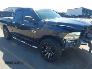 2018 Ram 1500 Big Horn z VIN 1C6RR7GG0JS218820, wystawiony jako IAAI lot #41747621 z przebiegiem 114 959 mil mil oraz . Historia ofert i sprzedaży dostępna na DreamBid. Obrazek 1.