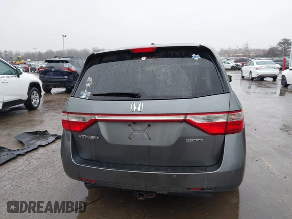 2011 Honda Odyssey Touring Elite with VIN 5FNRL5H9XBB090616, listed as a IAAI auction lot 41944510 with 207,962 mi miles and . Bid and sale history available at DreamBid. Image 17.