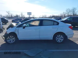 2012 Honda Civic LX with VIN 19XFB2F56CE379729, listed as a IAAI auction lot 41610909 with Not Provided miles and . Bid and sale history available at DreamBid. Image 14.