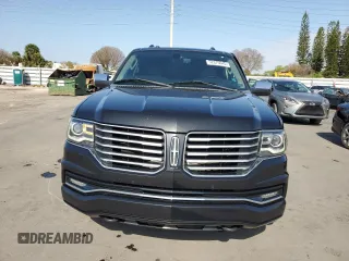 2015 Lincoln Navigator z VIN 5LMJJ2HT5FEJ06248, wystawiony jako Copart lot #52876645 z przebiegiem 270 523 mil mil oraz Szkoda całkowita • Salvage title. Historia ofert i sprzedaży dostępna na DreamBid. Obrazek 5.