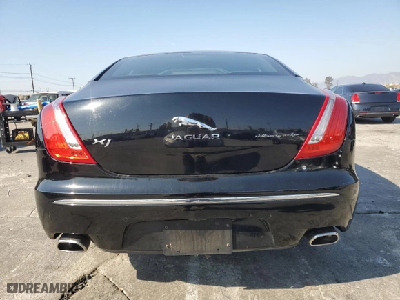 2011 Jaguar XJ with VIN SAJWA1CB4BLV05830, listed as a Copart auction lot 43007345 with NaN miles and Salvage Title. Bid and sale history available at carsss.com. Image 6.