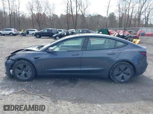 2023 Tesla Model 3 z VIN 5YJ3E1EA5PF451085, wystawiony jako IAAI lot #41941655 z przebiegiem 56 532 mil mil oraz . Historia ofert i sprzedaży dostępna na DreamBid. Obrazek 14.