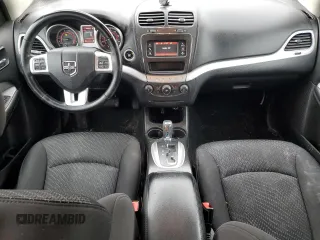 2017 Dodge Journey SXT with VIN 3C4PDCBG8HT545764, listed as a Copart auction lot 50450415 with 104,416 mi miles and Salvage Title. Bid and sale history available at carsss.com. Image 8.