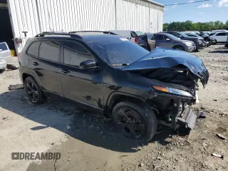 2016 Jeep Cherokee Limited with VIN 1C4PJMDB0GW366630, listed as a Copart auction lot 57622875 with 219,132 mi miles and Salvage title. Bid and sale history available at DreamBid. Image 4.