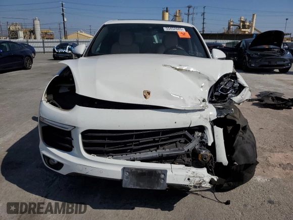 2016 Porsche Cayenne with VIN WP1AA2A20GLA00567, listed as a Copart auction lot 55452685 with Not provided miles and Salvage title. Bid and sale history available at DreamBid. Image 5.
