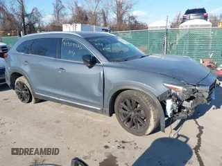 2021 Mazda CX-9 Grand Touring with VIN JM3TCBDY2M0530533, listed as a IAAI auction lot 41309425 with 84,747 mi miles. Bid and sale history available at carsss.com. Image 1.
