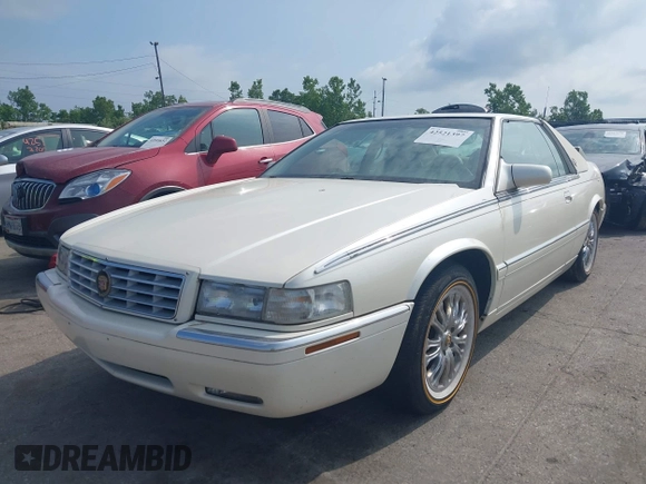 2001 Cadillac Eldorado ESC with VIN 1G6EL12Y01B104230, listed as a IAAI auction lot 42521397 with 60,570 mi miles and . Bid and sale history available at DreamBid. Image 2.