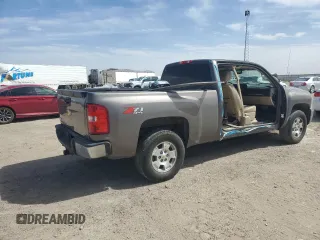 2011 Chevrolet Silverado 1500 LT with VIN 1GCRKSE33BZ332402, listed as a Copart auction lot 48675245 with 128,322 mi miles and Salvage Title. Bid and sale history available at DreamBid. Image 3.