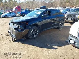 2023 Toyota bZ4X XLE with VIN JTMABACA2PA022658, listed as a IAAI auction lot 41650119 with 19,929 mi miles and . Bid and sale history available at DreamBid. Image 2.