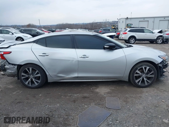2016 Nissan Maxima SV with VIN 1N4AA6AP6GC416407, listed as a IAAI auction lot 41227003 with 125,781 mi miles and . Bid and sale history available at DreamBid. Image 13.