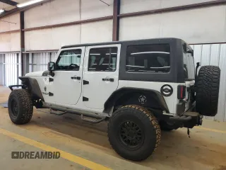 2012 Jeep Wrangler Unlimited Sport z VIN 1C4BJWDG4CL140250, wystawiony jako Copart lot #55174665 z przebiegiem 91 285 mil mil oraz Szkoda całkowita • Salvage title. Historia ofert i sprzedaży dostępna na DreamBid. Obrazek 2.