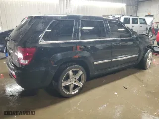 2007 Jeep Grand Cherokee SRT-8 with VIN 1J8HR78377C512937, listed as a Copart auction lot 83219784 with 158,485 mi miles and Salvage Title. Bid and sale history available at carsss.com. Image 3.