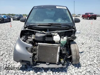 2015 Smart fortwo Passion z VIN WMEEJ3BA5FK819174, wystawiony jako Copart lot #53205005 z przebiegiem 78 364 mil mil oraz Szkody całkowita. Historia ofert i sprzedaży dostępna na DreamBid. Obrazek 5.