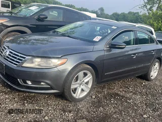2013 Volkswagen CC R-Line with VIN WVWBP7AN1DE571321, listed as a Copart auction lot 70648784 with 122,061 mi miles and Clean Title. Bid and sale history available at carsss.com. Image 1.