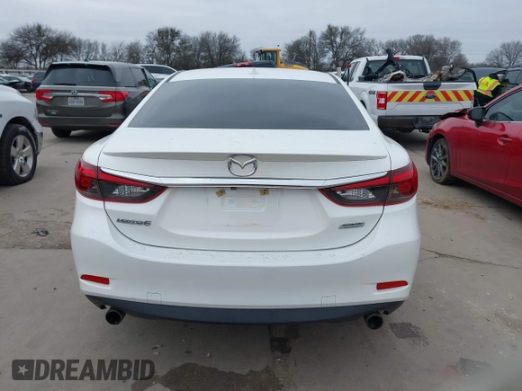 2017 Mazda 6 Grand Touring with VIN JM1GL1W57H1126716, listed as a IAAI auction lot 41619715 with 105,332 mi miles and . Bid and sale history available at DreamBid. Image 16.