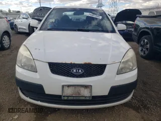 2007 Kia Rio LX with VIN KNADE123976187291, listed as a Copart auction lot 74561344 with 166,583 mi miles and Salvage Title. Bid and sale history available at carsss.com. Image 5.