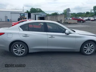 2015 Infiniti Q50 Sport with VIN JN1BV7AR1FM396590, listed as a IAAI auction lot 42687130 with 104,265 mi miles and . Bid and sale history available at DreamBid. Image 13.