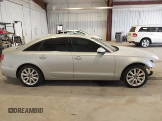 2015 Audi A6 Premium z VIN WAUFFAFC3FN021983, wystawiony jako IAAI lot #42105719 z przebiegiem 104 143 mil mil oraz . Historia ofert i sprzedaży dostępna na DreamBid. Obrazek 14.