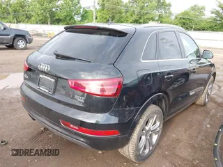 2015 Audi Q3 Premium Plus z VIN WA1EFCFS6FR001473, wystawiony jako IAAI lot #42795951 z przebiegiem 148 638 mil mil oraz . Historia ofert i sprzedaży dostępna na DreamBid. Obrazek 4.