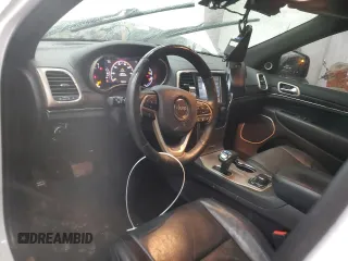 2015 Jeep Grand Cherokee Summit with VIN 1C4RJFJG9FC794992, listed as a Copart auction lot 42790355 with 74,044 mi miles and Salvage Title. Bid and sale history available at DreamBid. Image 8.