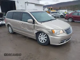 2014 Chrysler Town & Country Touring with VIN 2C4RC1BG2ER212233, listed as a IAAI auction lot 41836648 with 105,034 mi miles. Bid and sale history available at carsss.com. Image 1.