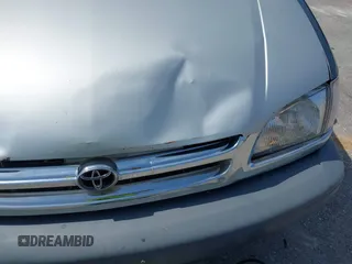 2000 Toyota Sienna LE with VIN 4T3ZF13C4YU211145, listed as a IAAI auction lot 42705612 with 217,825 mi miles and . Bid and sale history available at DreamBid. Image 6.