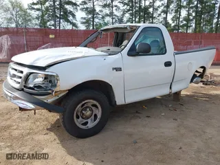 1999 Ford F-150 Work Series with VIN 1FTZF1728XKA04105, listed as a IAAI auction lot 41856047 with 176,890 mi miles. Bid and sale history available at carsss.com. Image 2.