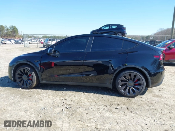 2021 Tesla Model Y Performance with VIN 5YJYGDEF6MF252877, listed as a IAAI auction lot 41770770 with 58,550 mi miles and . Bid and sale history available at DreamBid. Image 14.