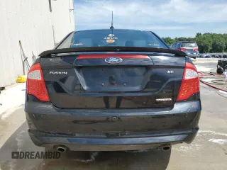 2012 Ford Fusion SE z VIN 3FAHP0HGXCR117692, wystawiony jako Copart lot #56026555 z przebiegiem 236 669 mil mil oraz Szkoda całkowita • Salvage title. Historia ofert i sprzedaży dostępna na DreamBid. Obrazek 6.