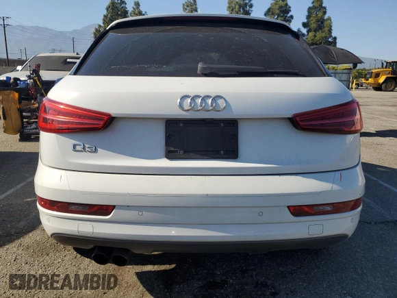 2018 Audi Q3 Premium Plus with VIN WA1HCCFS5JR013581, listed as a Copart auction lot 56422095 with 103,565 mi miles and Salvage title. Bid and sale history available at DreamBid. Image 6.