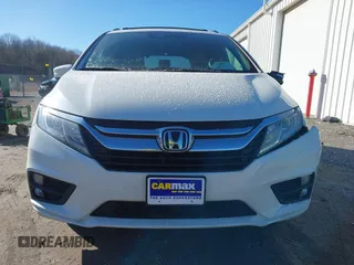 2018 Honda Odyssey EX-L with VIN 5FNRL6H75JB044422, listed as a IAAI auction lot 41730576 with 120,587 mi miles and . Bid and sale history available at DreamBid. Image 12.