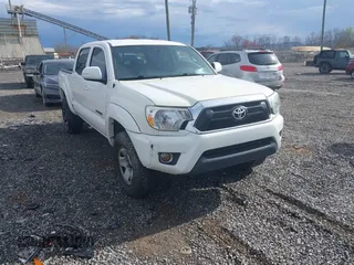 2015 Toyota Tacoma z VIN 3TMLU4EN5FM188601, wystawiony jako IAAI lot #41883555 z przebiegiem 143 904 mil mil oraz . Historia ofert i sprzedaży dostępna na DreamBid. Obrazek 1.