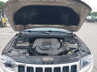 2014 Jeep Grand Cherokee Limited z VIN 1C4RJFBG8EC408754, wystawiony jako IAAI lot #42612211 z przebiegiem 149 017 mil mil oraz . Historia ofert i sprzedaży dostępna na DreamBid. Obrazek 10.