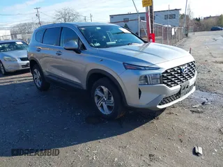 2021 Hyundai Santa Fe SE with VIN 5NMS1DAJ0MH322907, listed as a IAAI auction lot 41103803 with 58,046 mi miles. Bid and sale history available at carsss.com. Image 1.