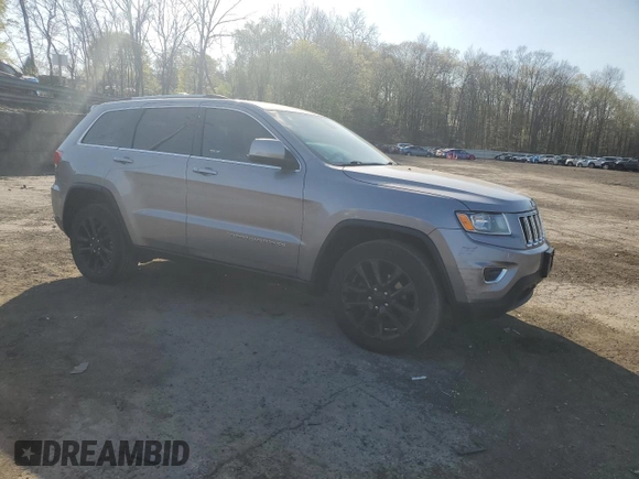 2014 Jeep Grand Cherokee Laredo with VIN 1C4RJFAG3EC150774, listed as a Copart auction lot 54376995 with 153,012 mi miles and Salvage Title. Bid and sale history available at DreamBid. Image 4.