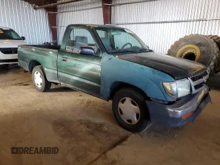 1999 Toyota Tacoma z VIN 4TANL42N6XZ561222, wystawiony jako Copart lot #45721925 z przebiegiem 221 521 mil mil oraz Szkoda całkowita • Salvage title. Historia ofert i sprzedaży dostępna na DreamBid. Obrazek 4.