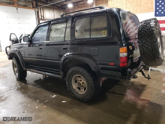 1996 Toyota Land Cruiser with VIN JT3HJ85J0T0131986, listed as a Copart auction lot 49455575 with 281,291 mi miles and Salvage Title. Bid and sale history available at carsss.com. Image 2.