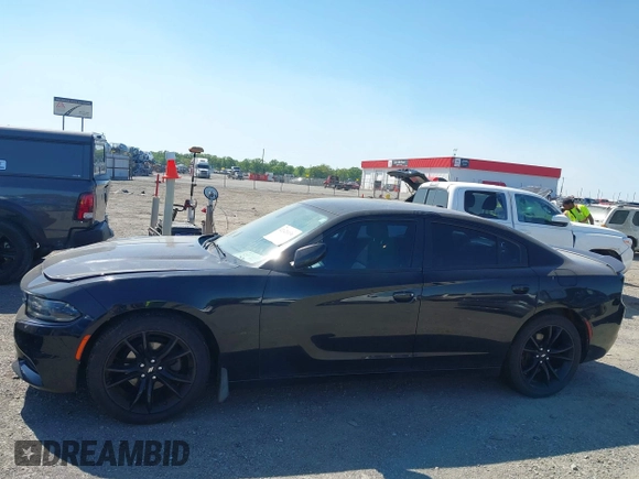 2018 Dodge Charger SXT with VIN 2C3CDXBG8JH134938, listed as a IAAI auction lot 42021136 with 127,596 mi miles and . Bid and sale history available at DreamBid. Image 12.