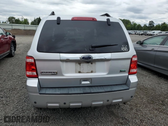 2010 Ford Escape Limited with VIN 1FMCU0EG9AKA54244, listed as a Copart auction lot 56930955 with 88,496 mi miles and Salvage title. Bid and sale history available at DreamBid. Image 6.