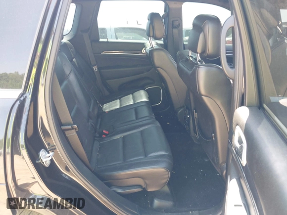 2016 Jeep Grand Cherokee Overland with VIN 1C4RJFCG5GC408390, listed as a IAAI auction lot 42140038 with 140,507 mi miles and . Bid and sale history available at DreamBid. Image 8.