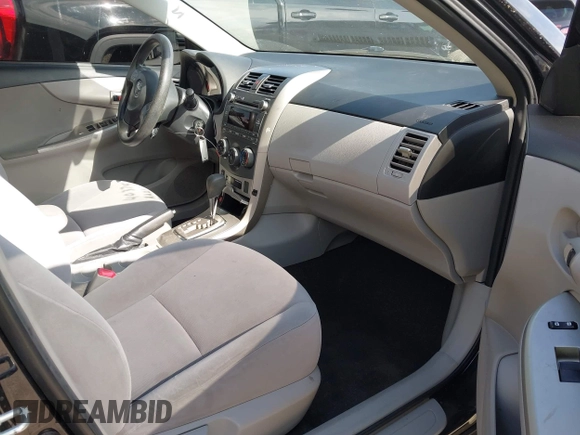 2011 Toyota Corolla L with VIN JTDBU4EE0B9154747, listed as a IAAI auction lot 42028887 with 141,569 mi miles. Bid and sale history available at carsss.com. Image 5.