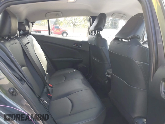 2022 Toyota Prius LE with VIN JTDKAMFP7N3206830, listed as a IAAI auction lot 41984239 with 57,681 mi miles and . Bid and sale history available at DreamBid. Image 8.