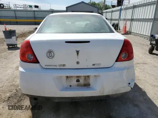 2010 Pontiac G6 1SB z VIN 1G2ZA5E00A4118557, wystawiony jako Copart lot #53303025 z przebiegiem Nie podano mil oraz Szkody całkowita. Historia ofert i sprzedaży dostępna na DreamBid. Obrazek 6.