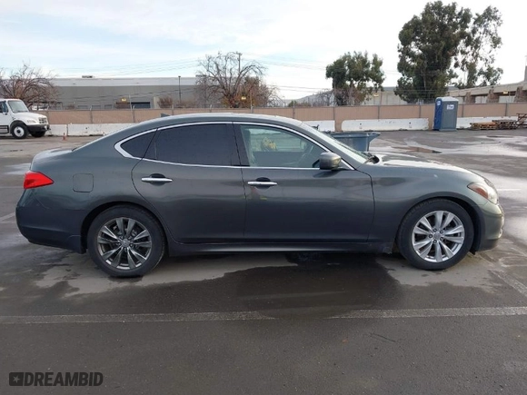 2013 Infiniti M37 with VIN JN1BY1AP8DM513615, listed as a IAAI auction lot 41572602 with 96,950 mi miles. Bid and sale history available at carsss.com. Image 13.